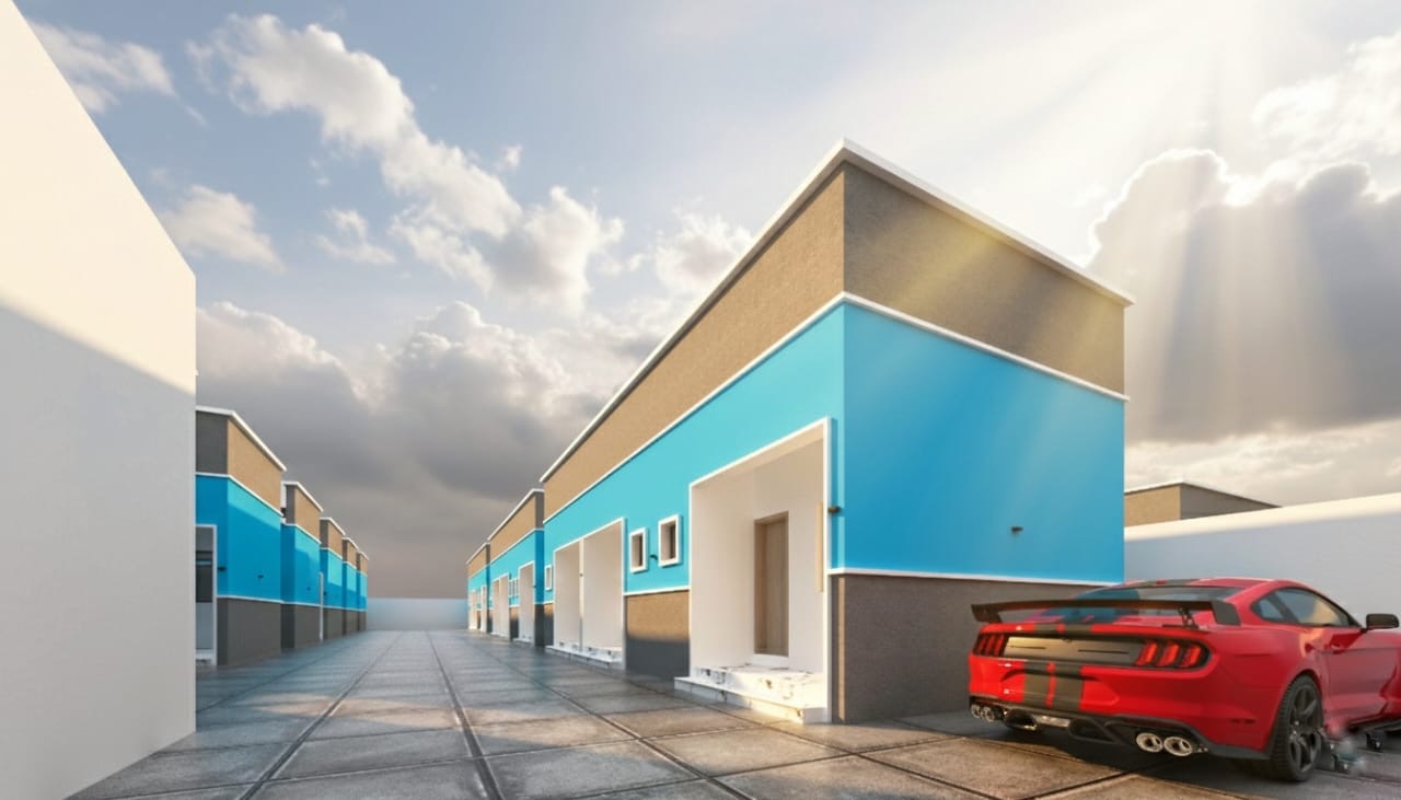 Perspective of turquoise and grey lodge blocks around a paved courtyard